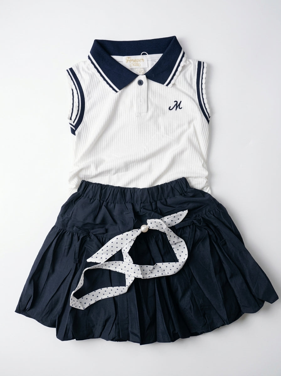 Conjunto Polo Blanco Falda Azul Monograma